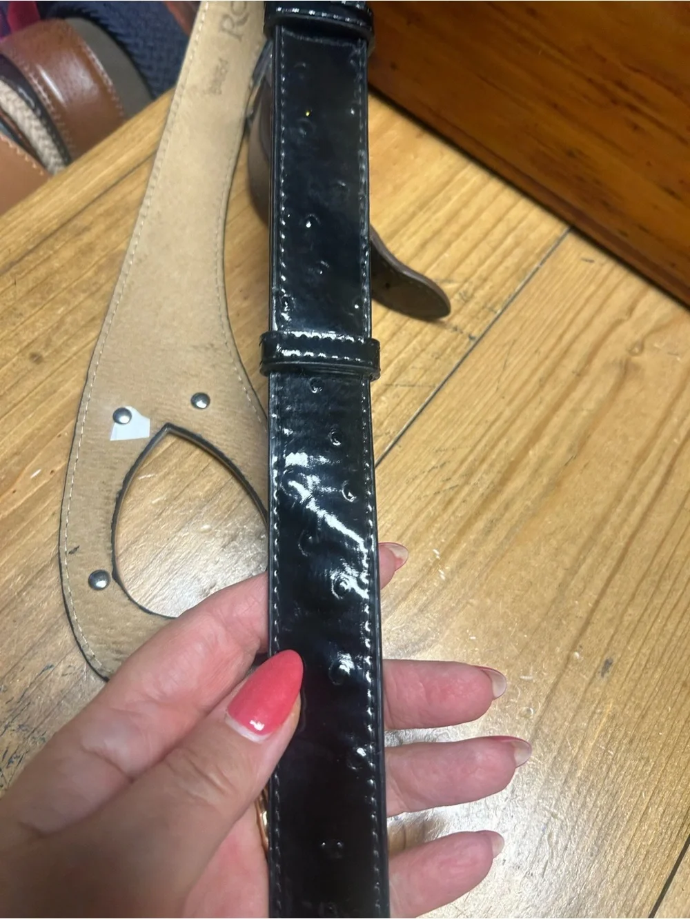 Rolfs Embossed patent leather belt. Size small adjustable versatile styling
